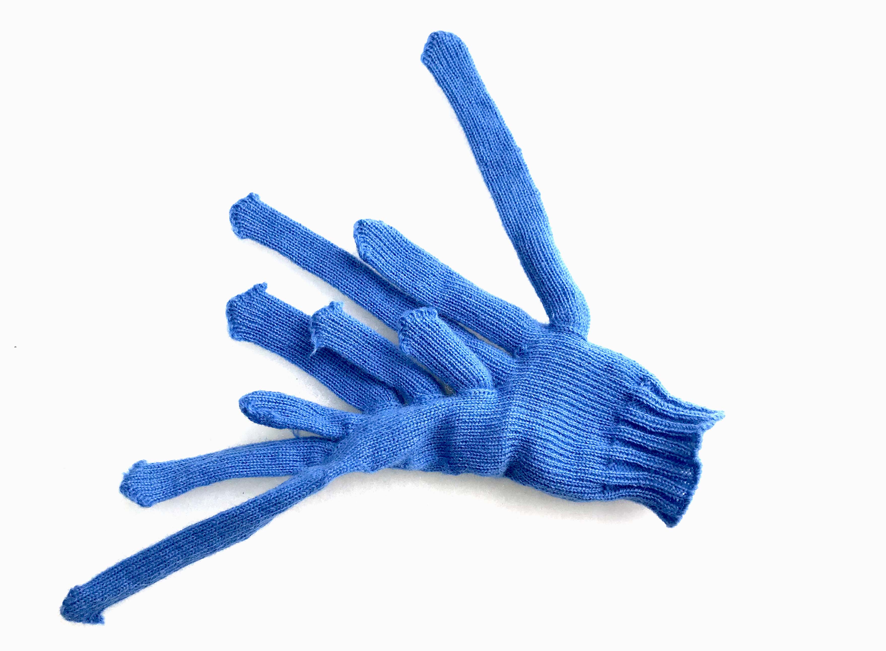 Another glove with slightly too many fingers and thumbs.